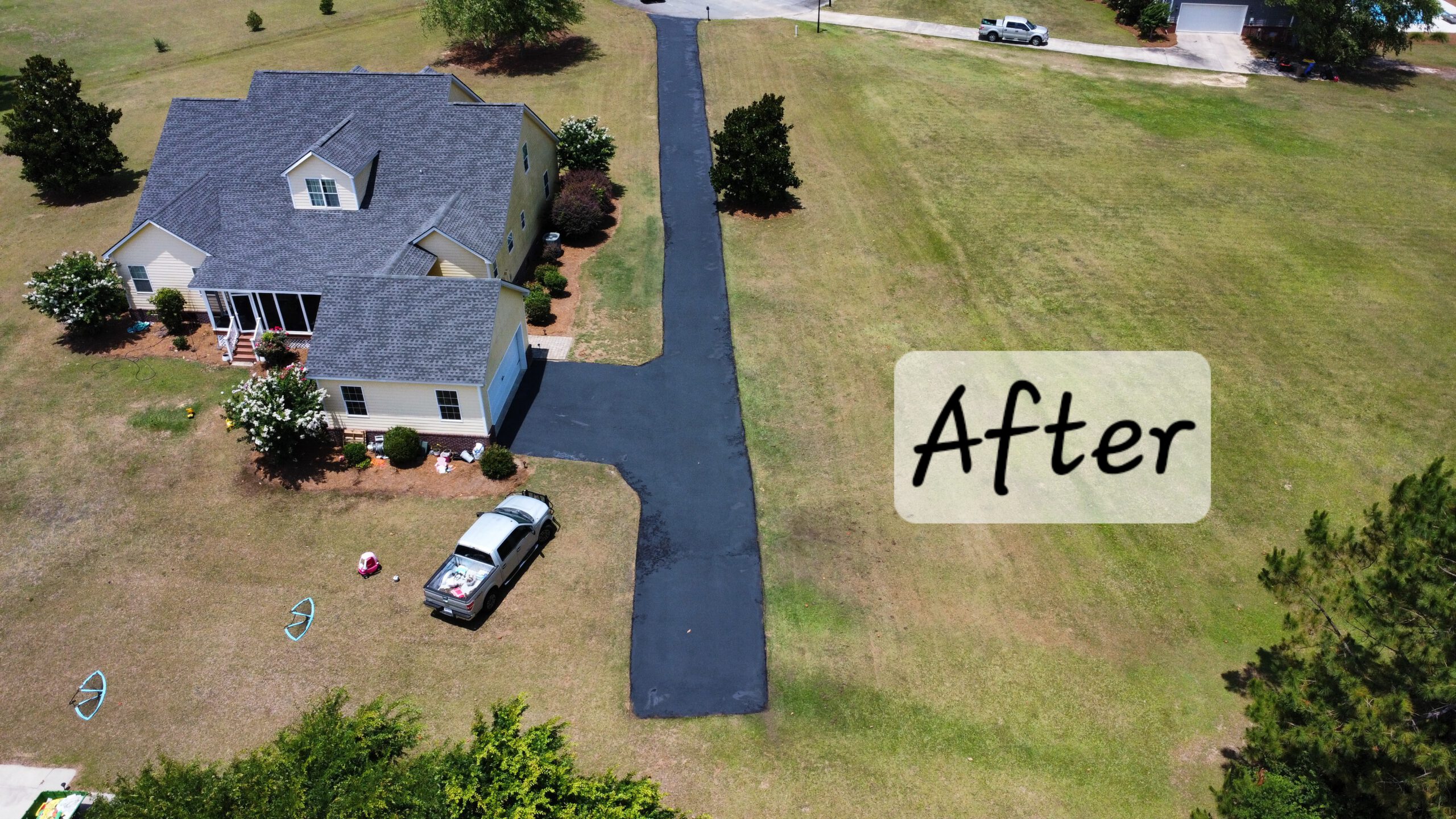 Fresh dark black sealcoated driveway