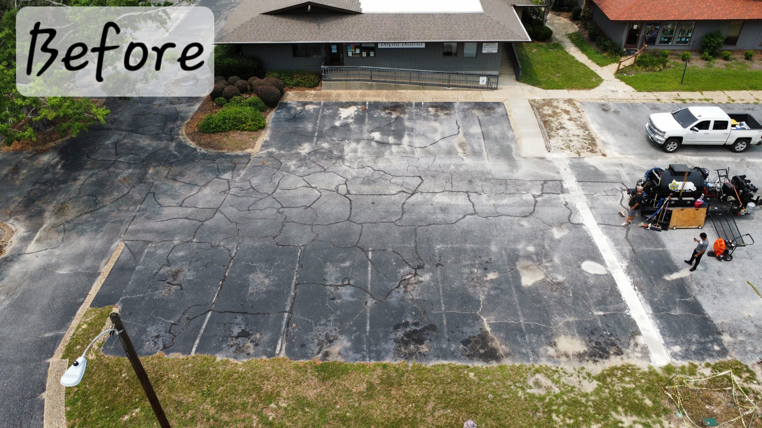 Worn parking lot without proper ADA markings
