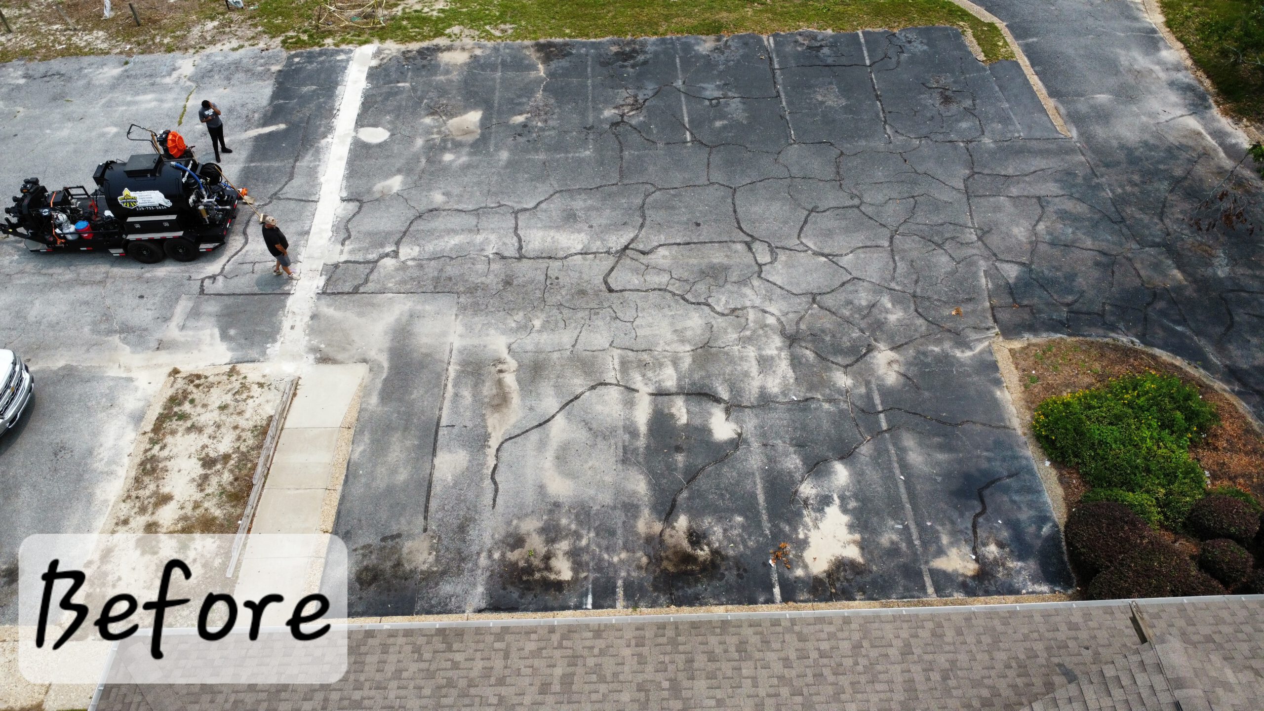 Faded parking lot lines before restriping