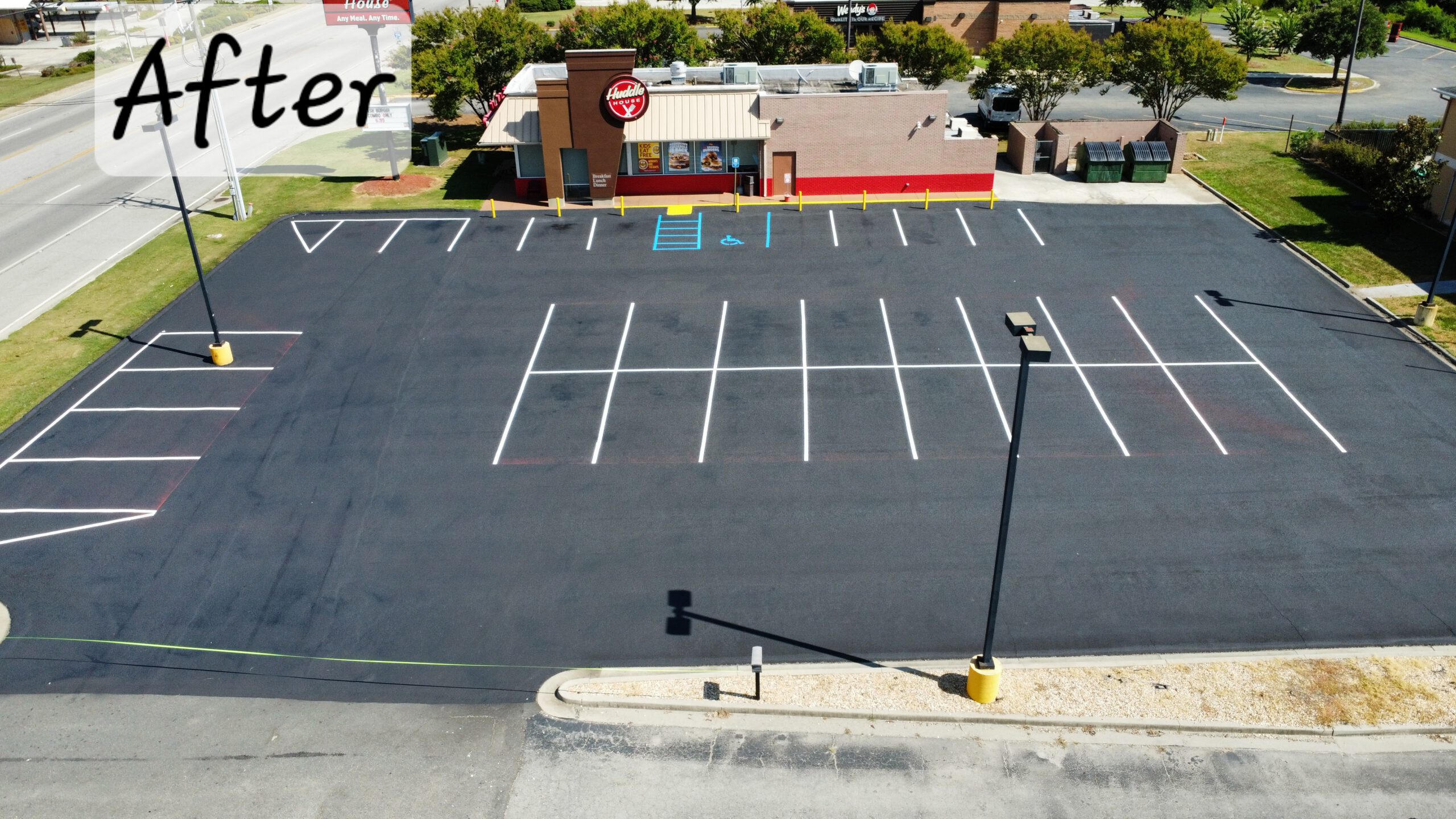 Same commercial lot with fresh white striping