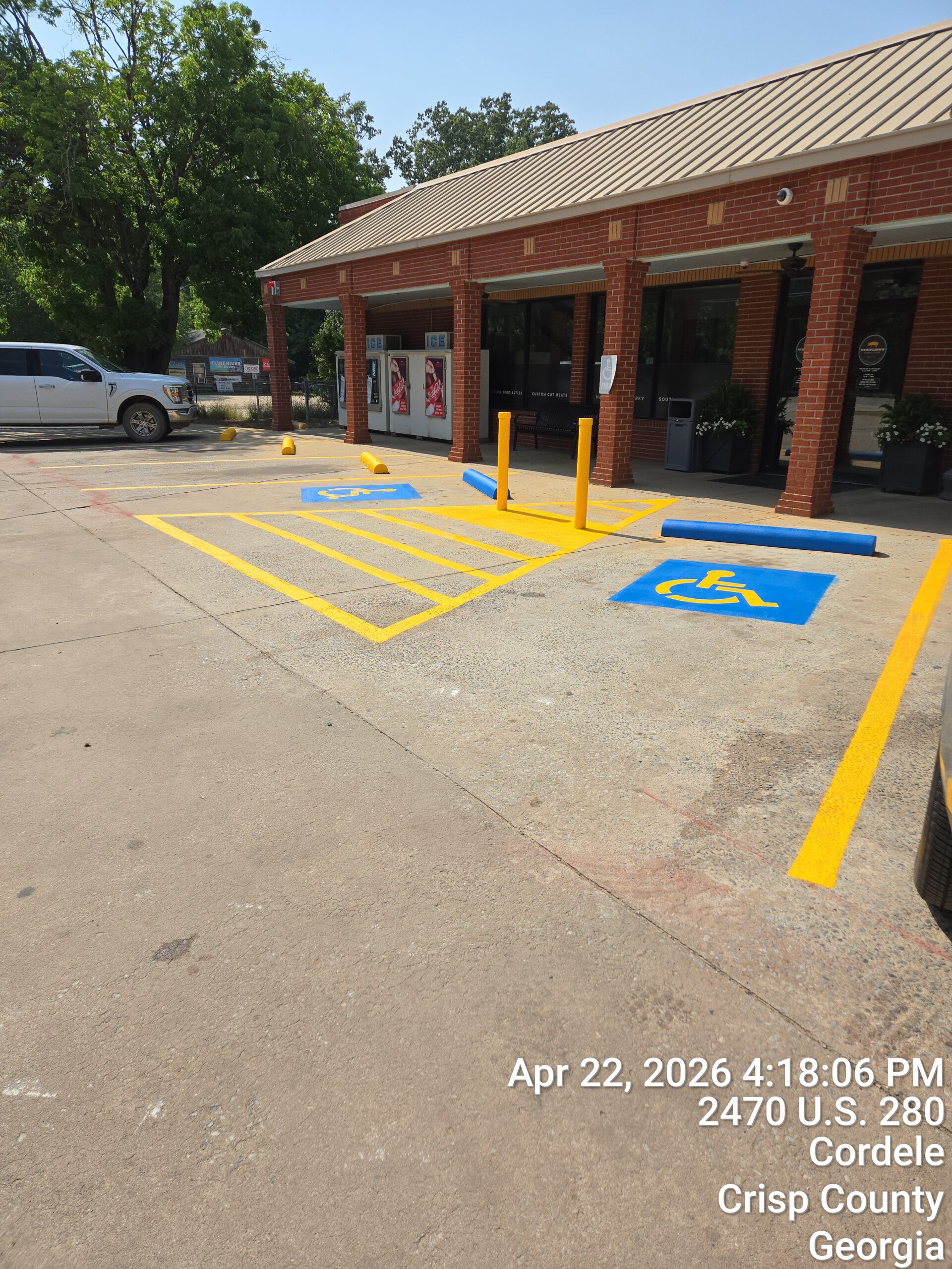 ADA handicap parking markings with wheel stops in Cordele Georgia