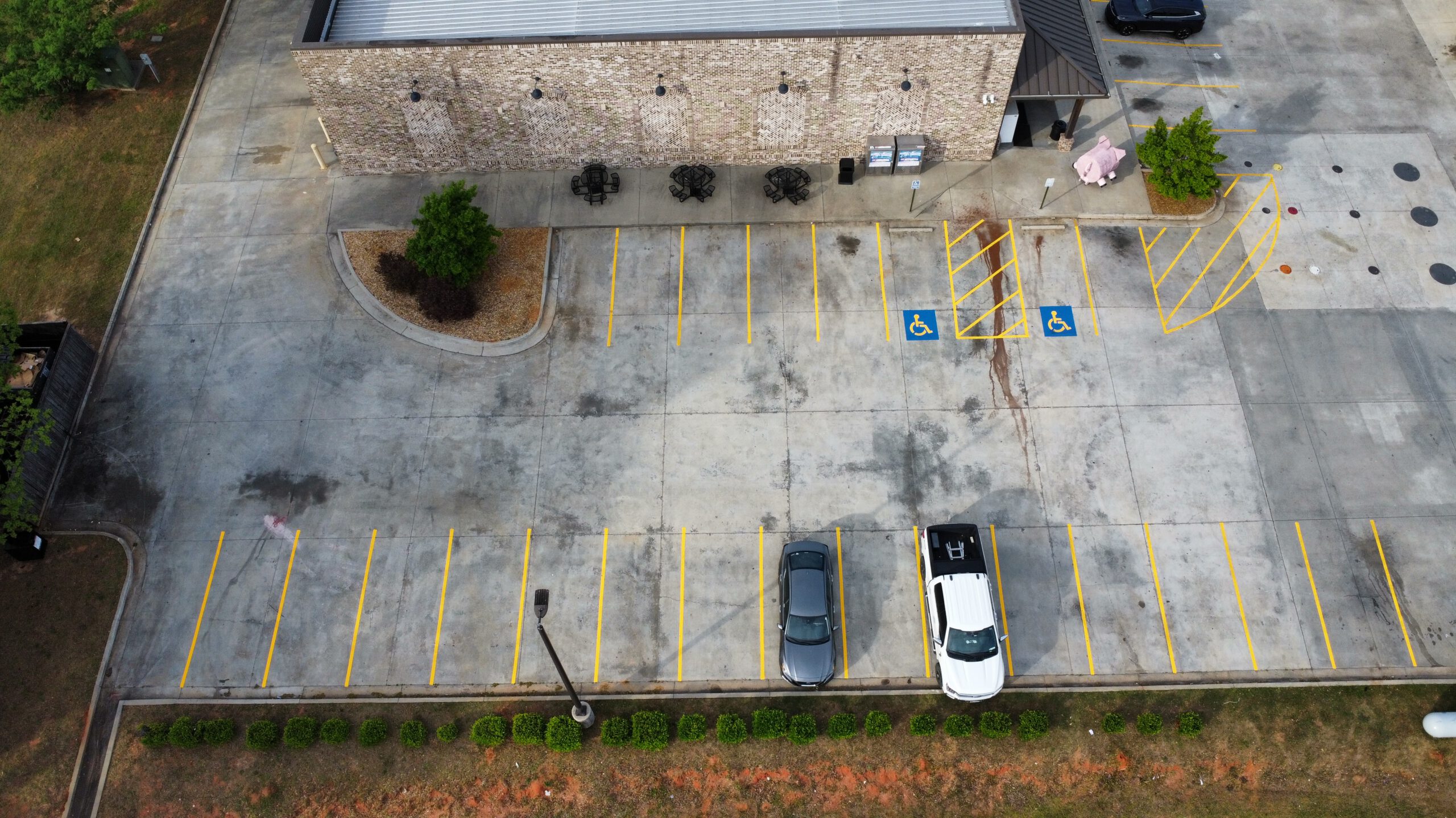 Aerial view of freshly striped commercial parking lot in Cordele Georgia
